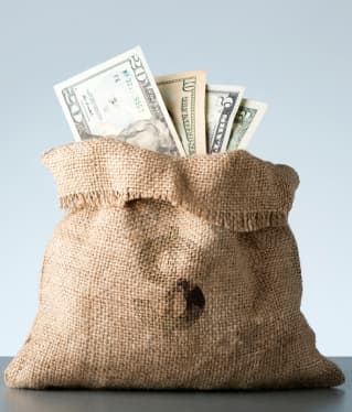 burlap-with-dollar-banknotes